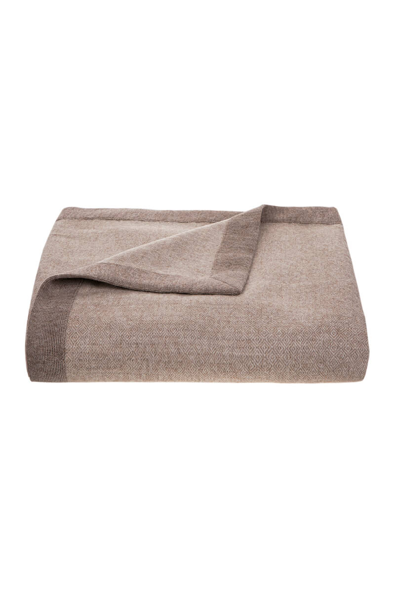 Elegant woven premium alpaca throw with knitted trim in mink by Tuwi